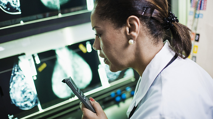 Medical Researcher Using Dictaphone Medical Researcher Using Dictaphone --- Image by � Tim Pannell/Corbis